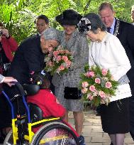 Emperor, empress meet handicapped children